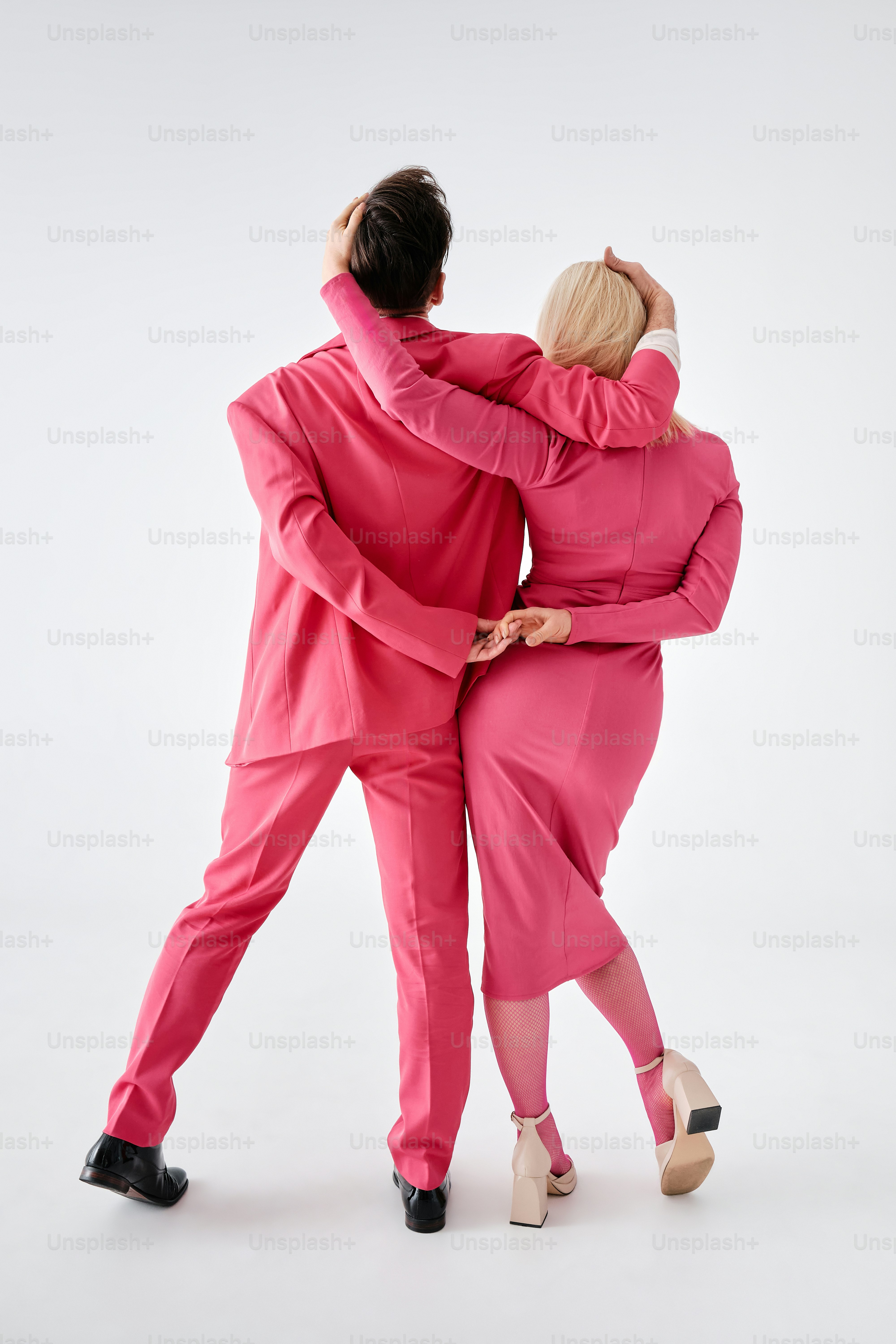 a couple of people that are standing up