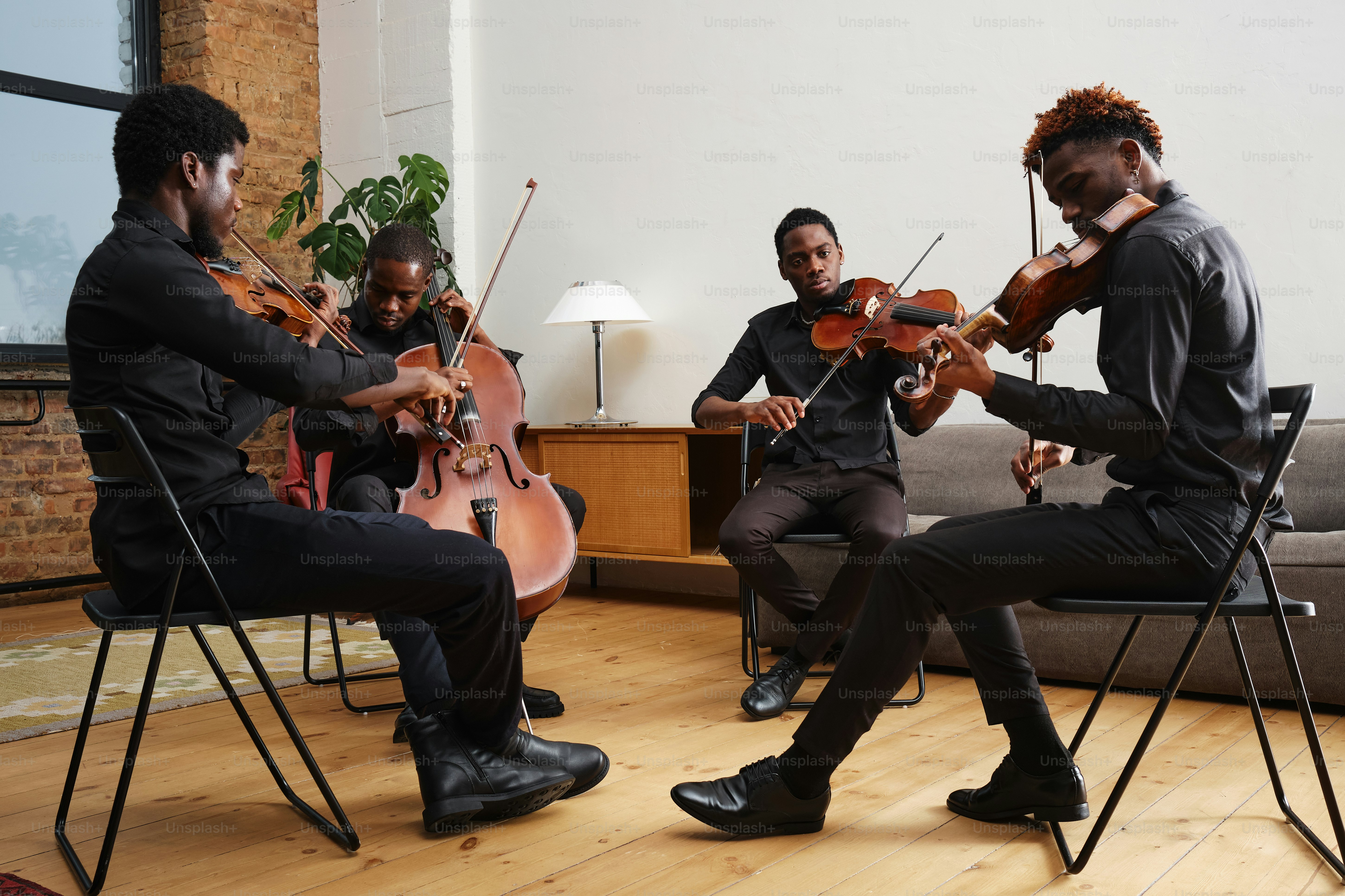 a group of men playing instruments in a living room