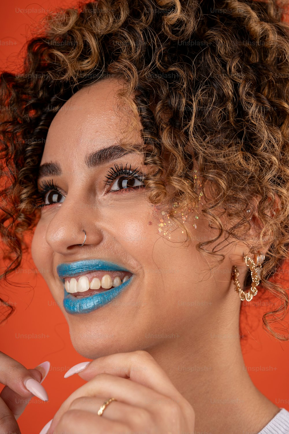 a close up of a person with blue lipstick