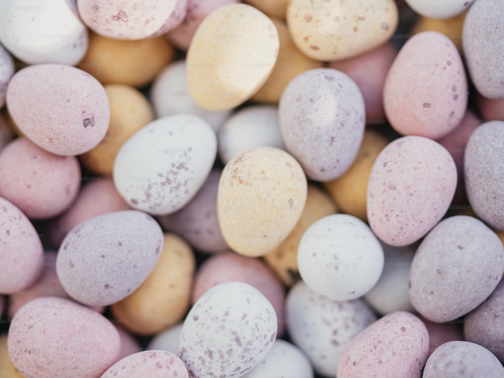 a close up of a bunch of candy eggs