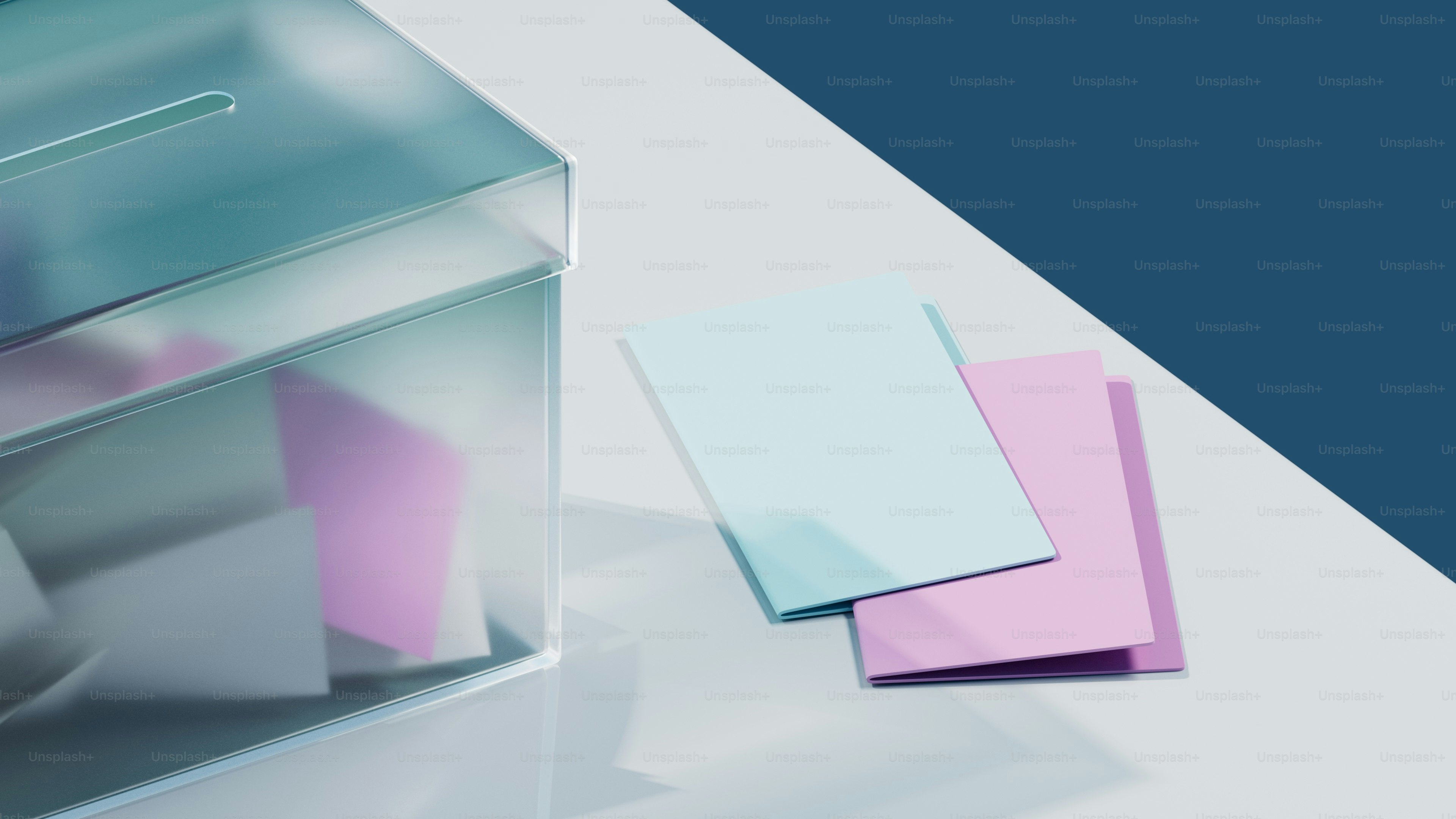 three different colored papers sitting next to each other