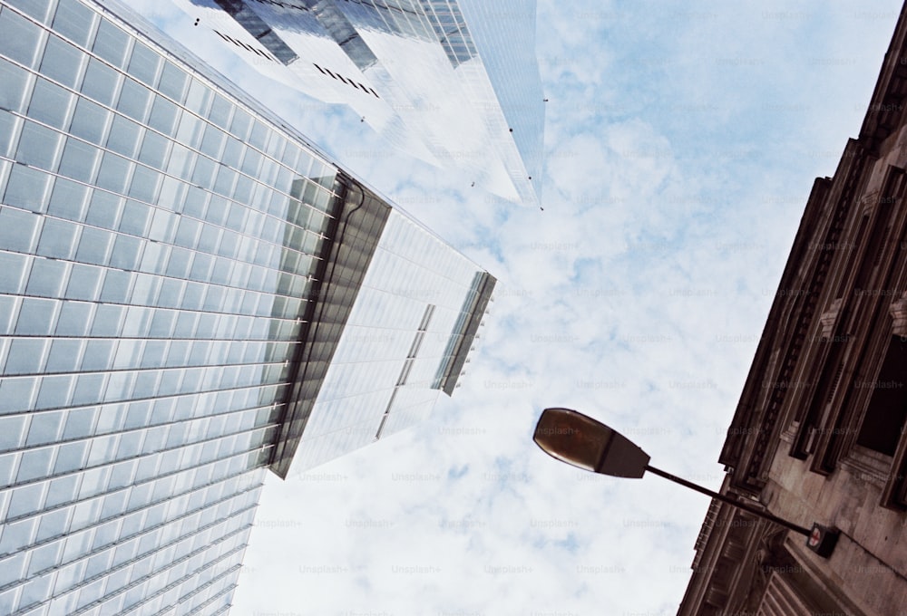 a tall building with a street light in front of it