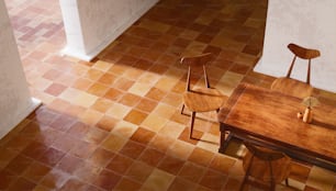 a table and two chairs in a room