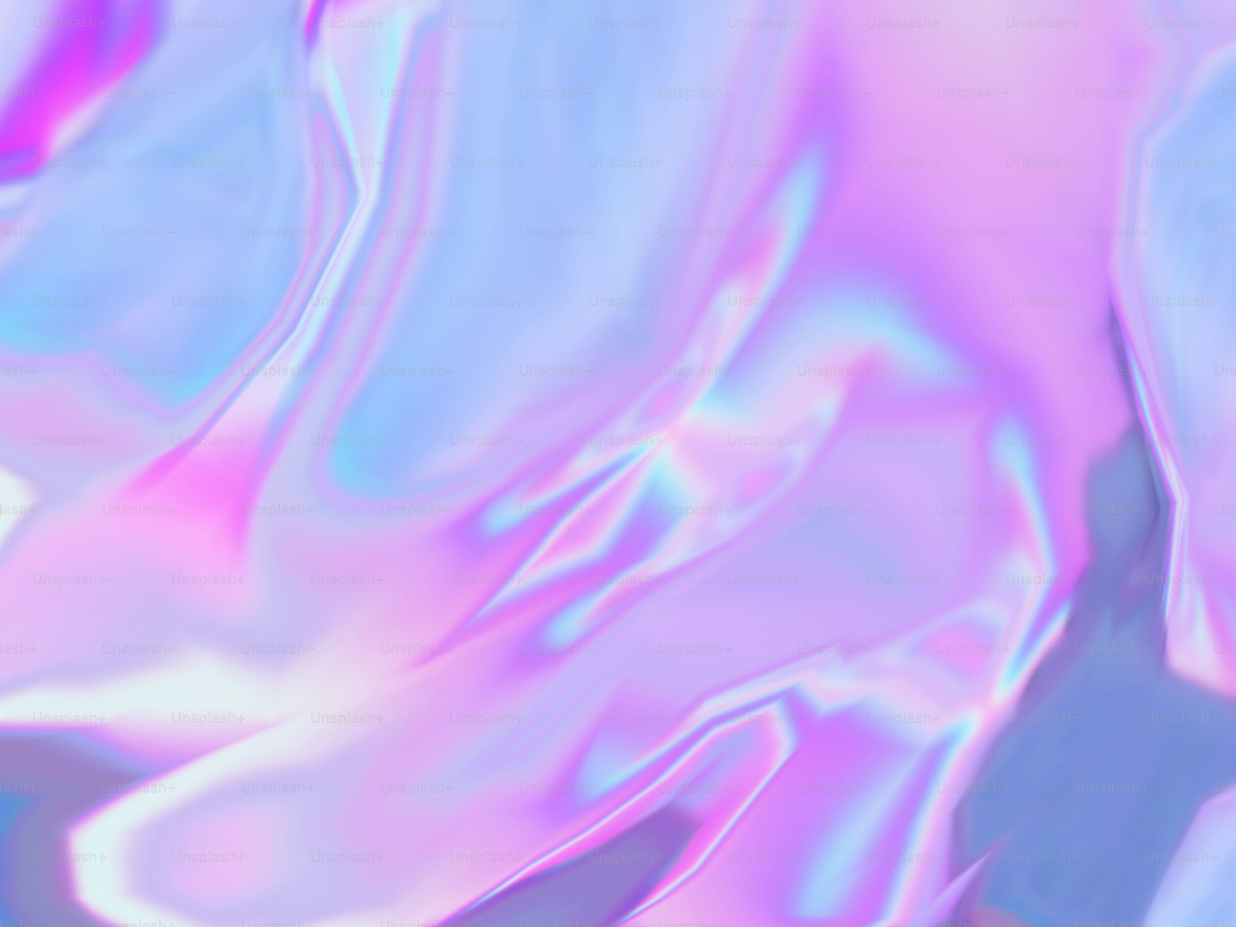 Ein verschwommenes Bild mit einem rosa und blauen Hintergrund