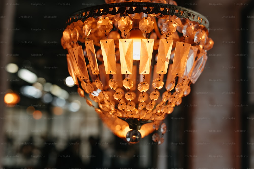 a chandelier hanging from a ceiling in a room