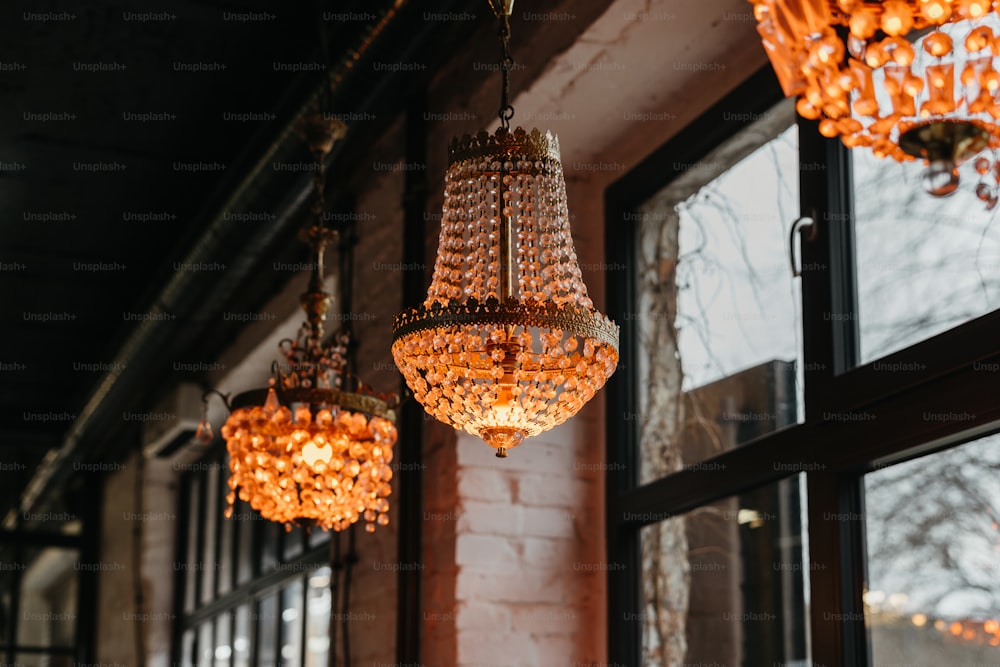 a bunch of chandeliers hanging from a ceiling