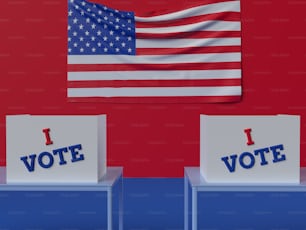 Dos sillas con carteles de "Yo voto" frente a una bandera estadounidense