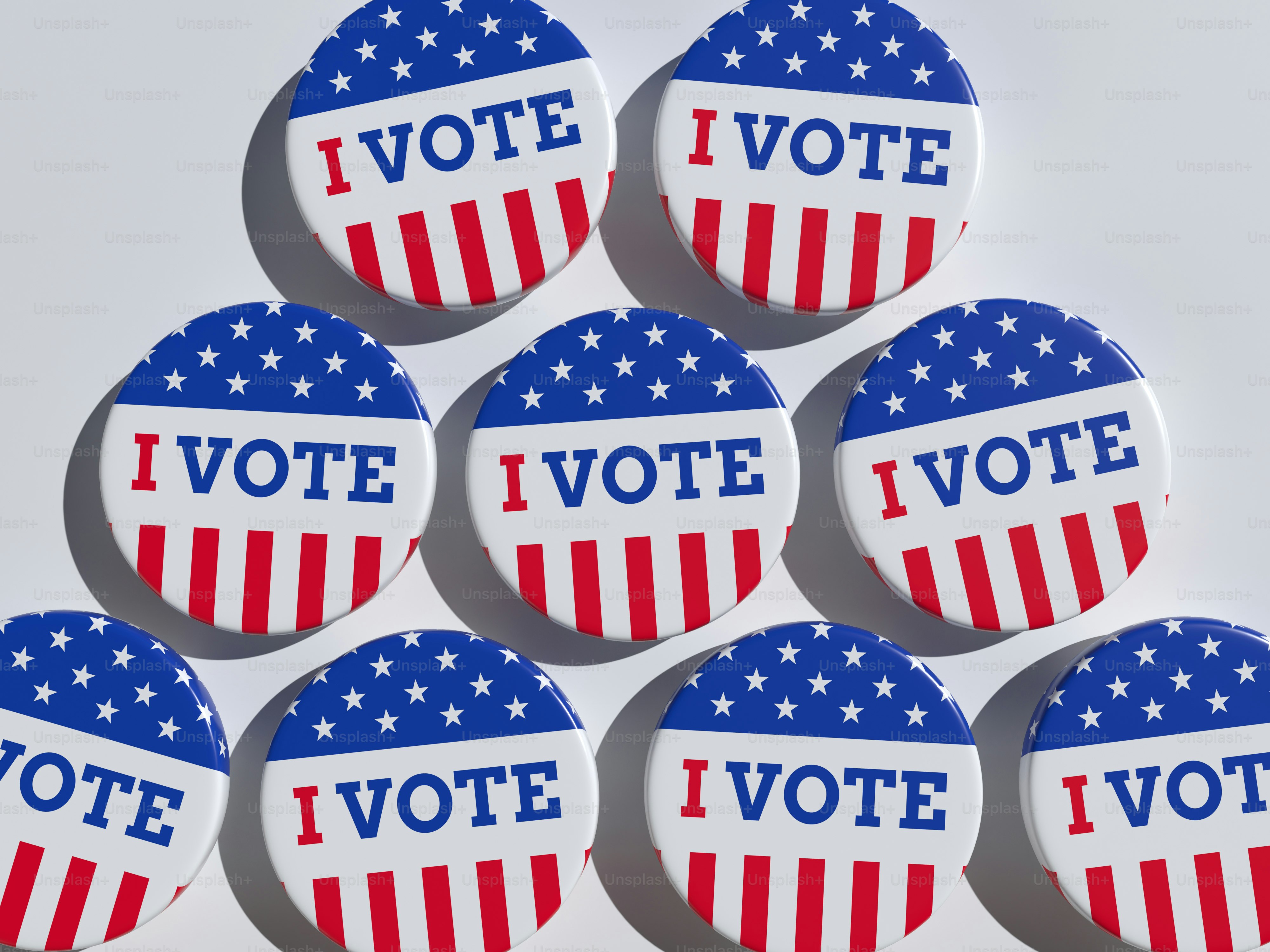 a bunch of buttons with the words vote on them