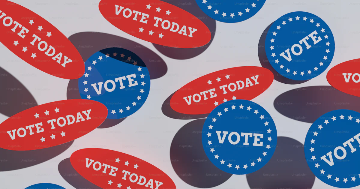 A group of red, white and blue stickers with vote today written on them ...