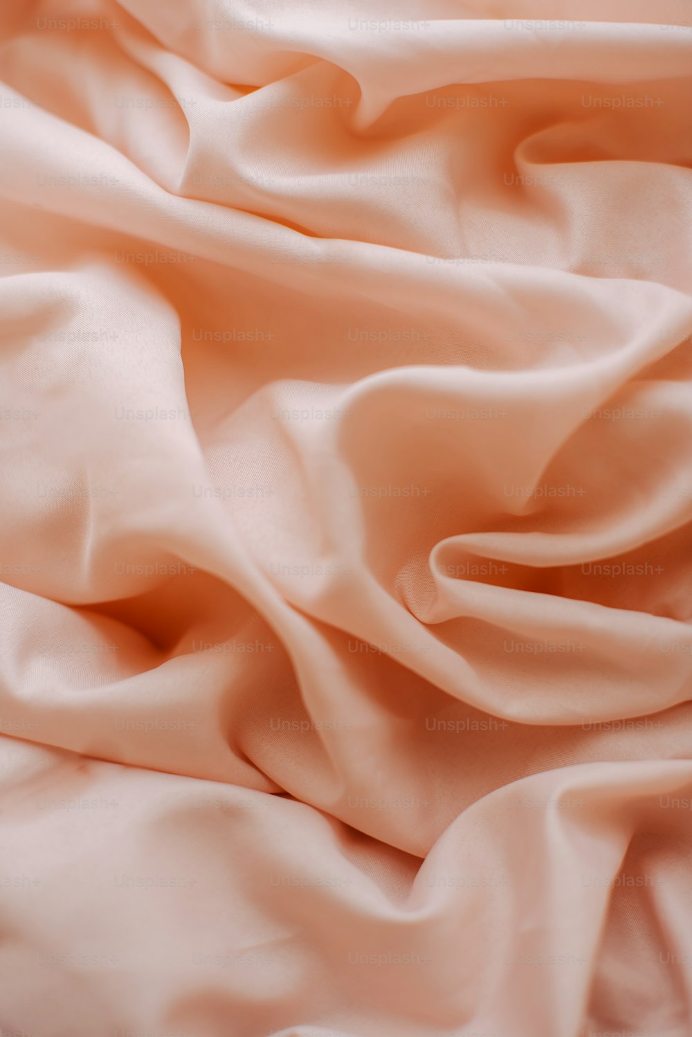 Eine Nahaufnahme eines rosafarbenen Stoffes