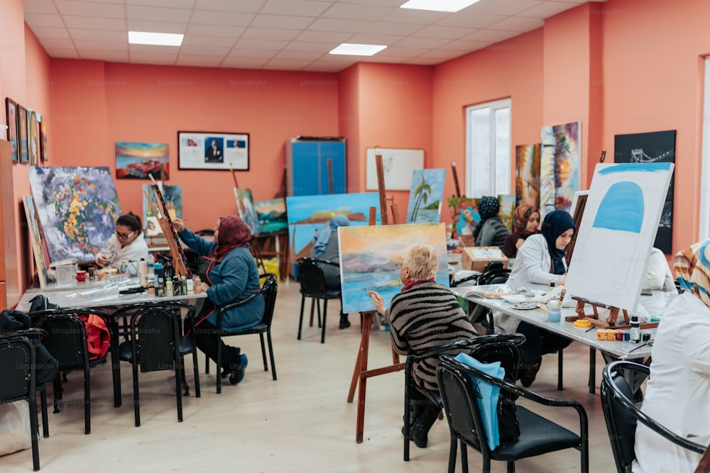 a group of people painting in a room