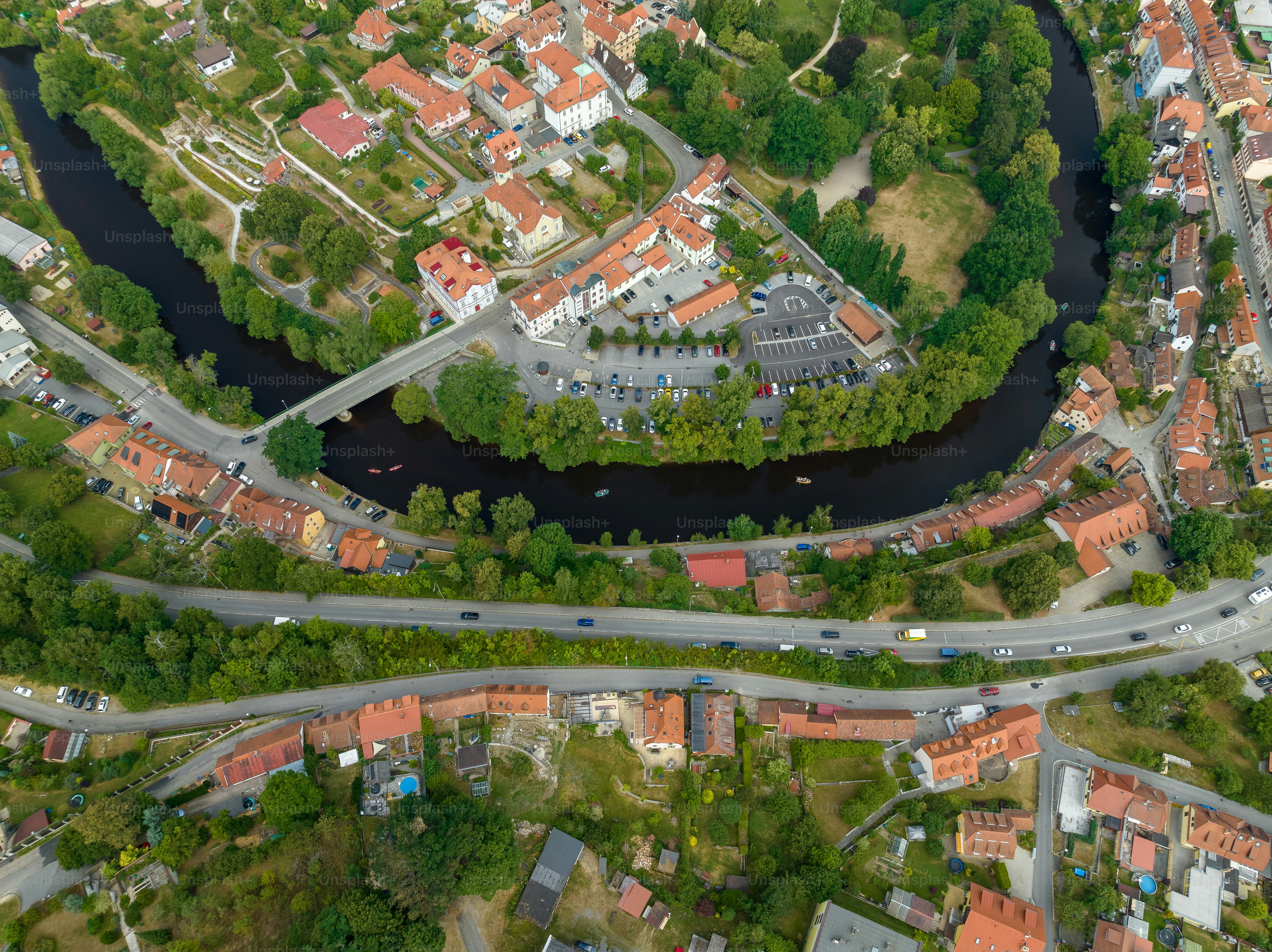 an aerial view of a city with a river running through it