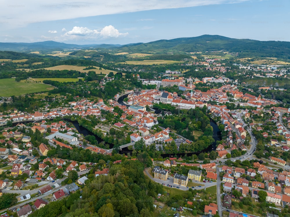 an aerial view of a city with a river running through it