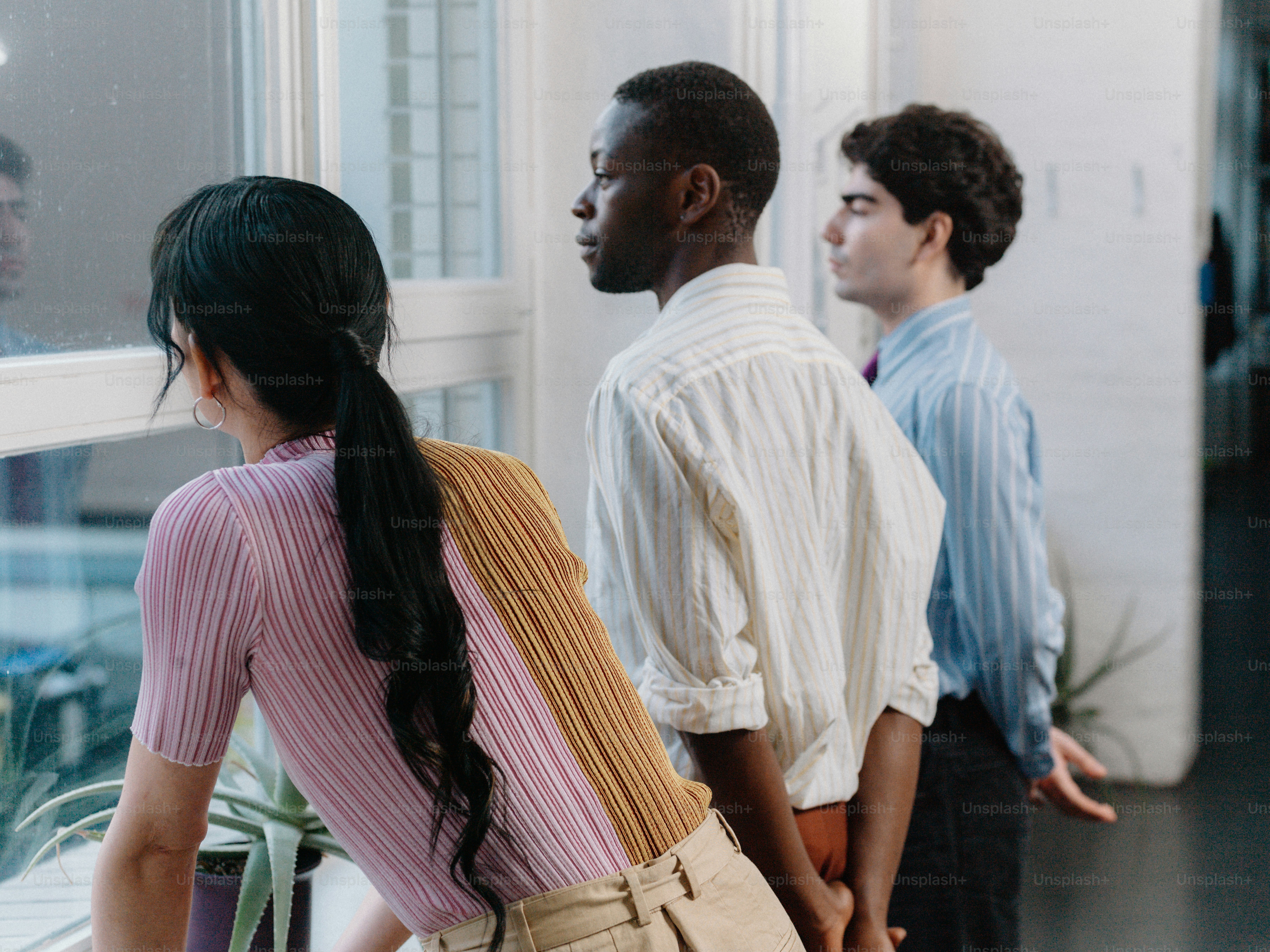 a group of people standing next to each other