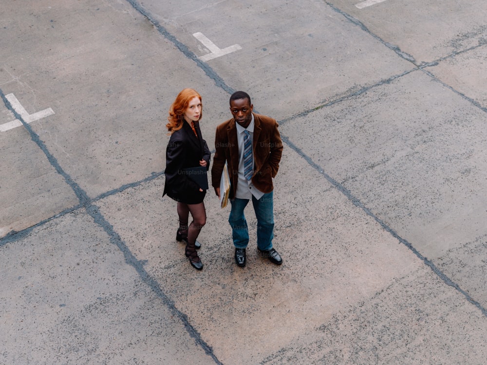 a couple of people that are standing in the street