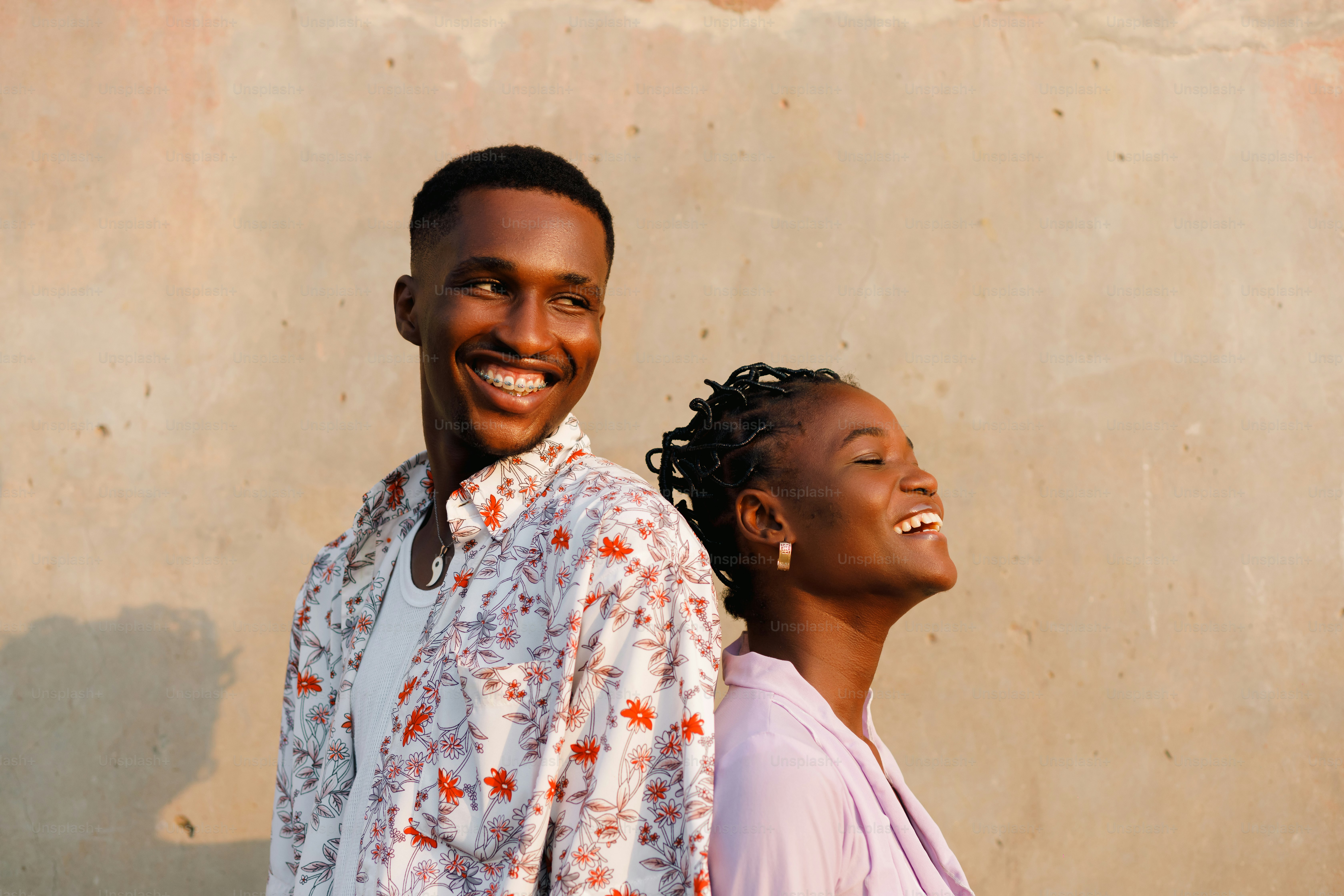 a man and a woman standing next to each other