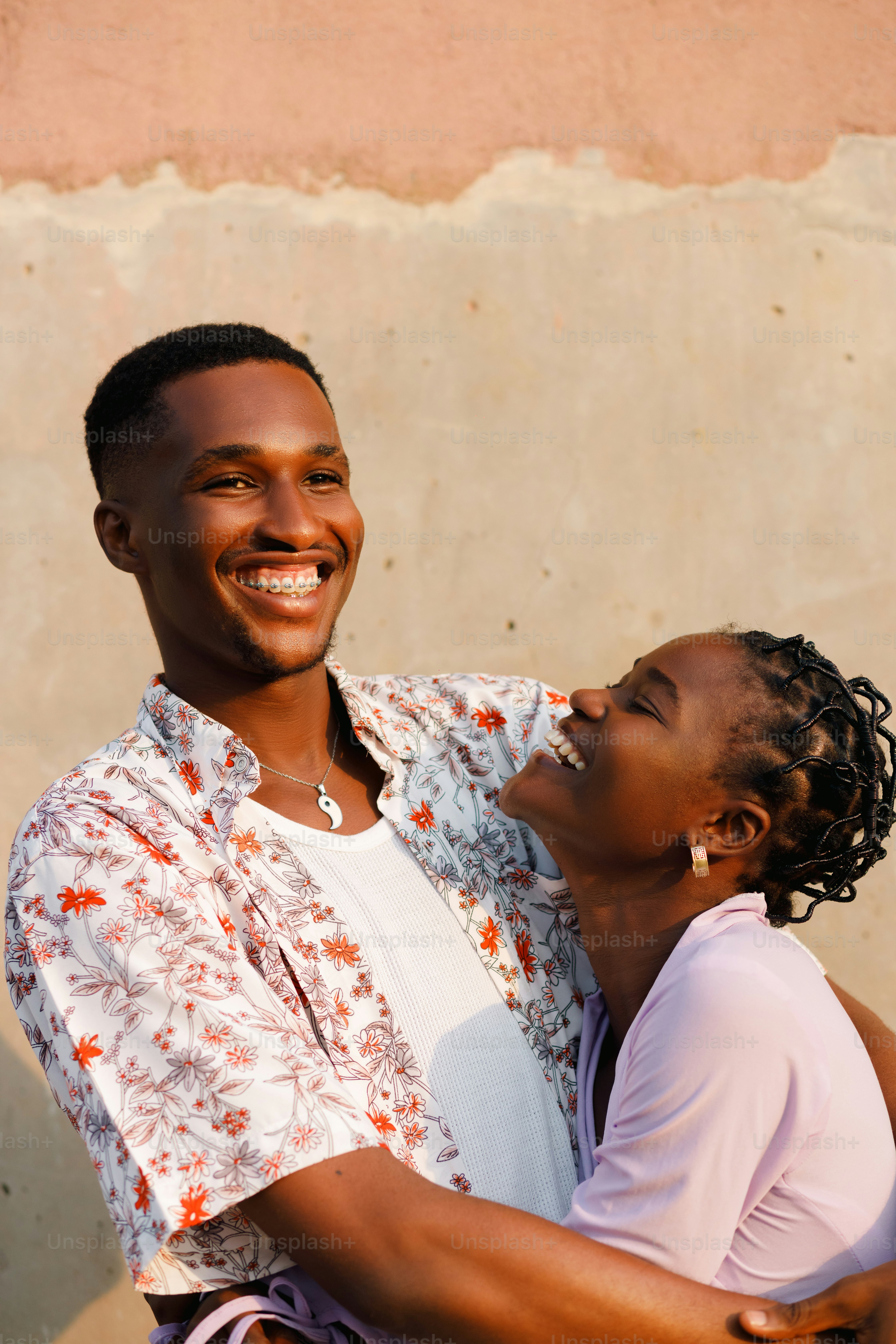 a man and a woman embracing each other