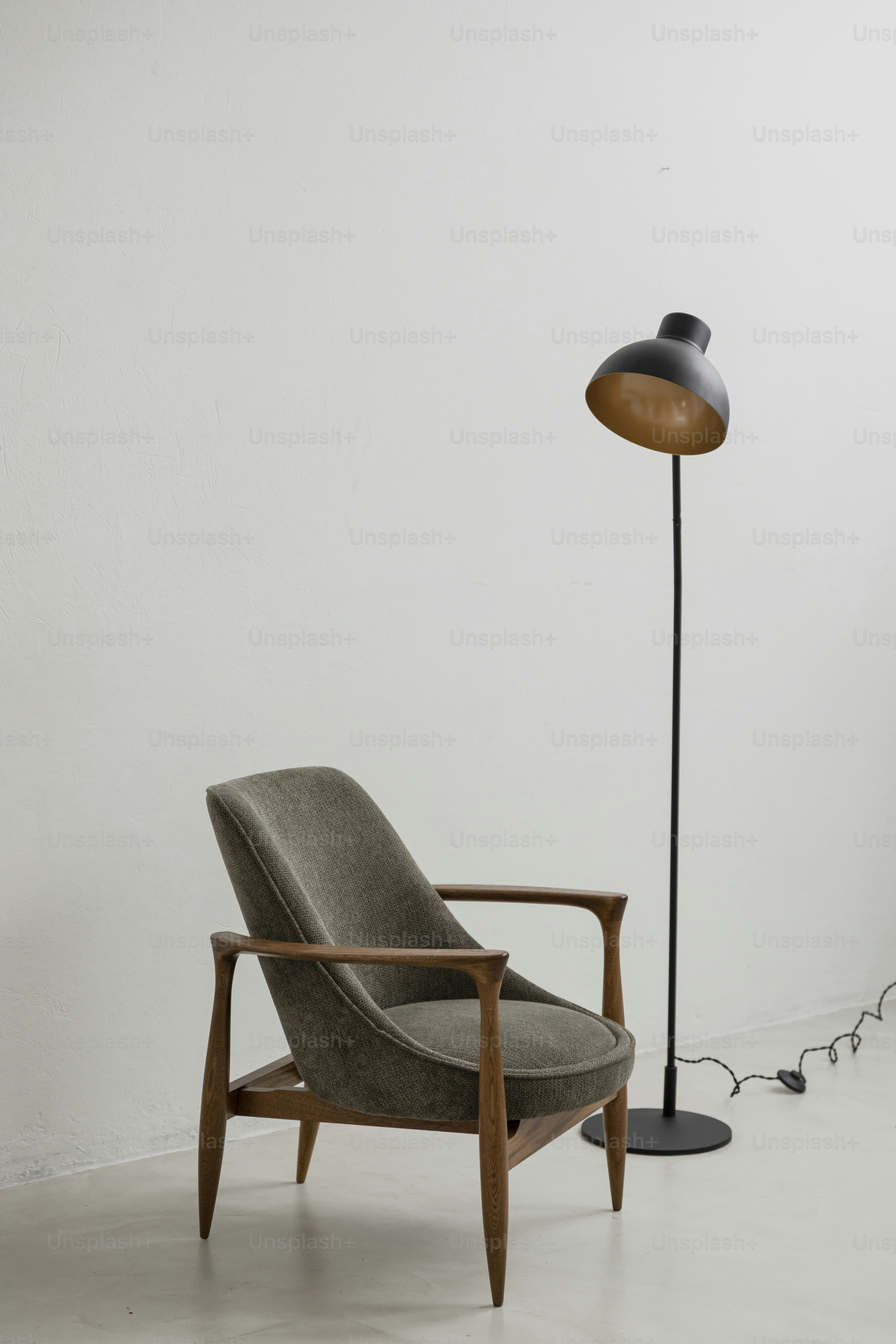 a chair and a lamp in a room