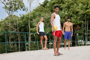 a group of young men standing next to each other