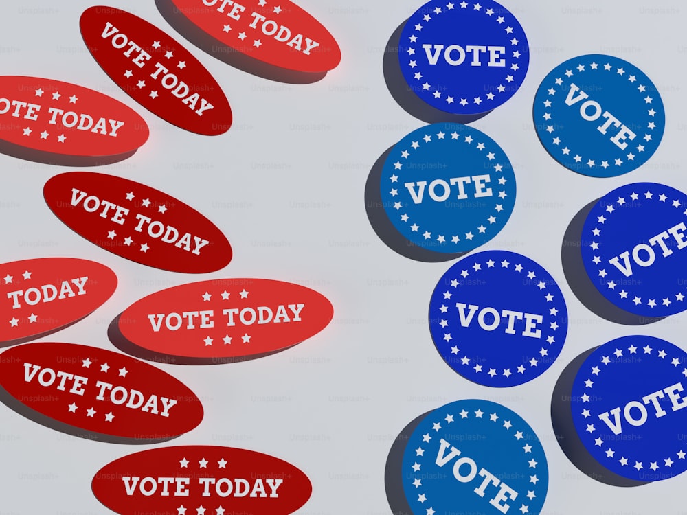 a group of red, white and blue vote stickers
