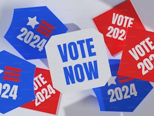 a group of vote now stickers on top of each other