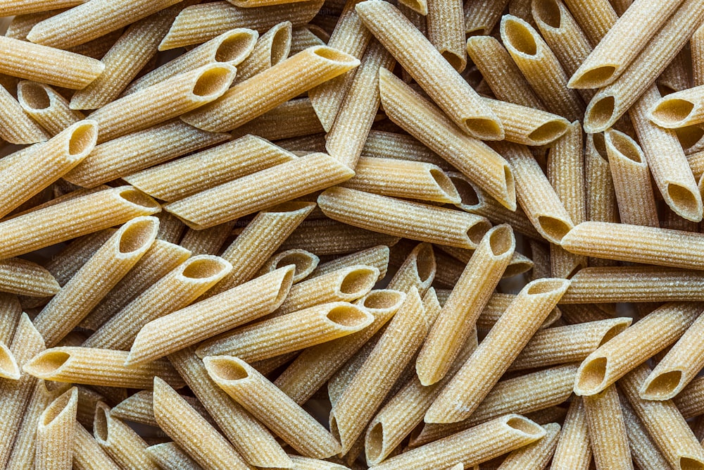 a close up of a bunch of pasta shells