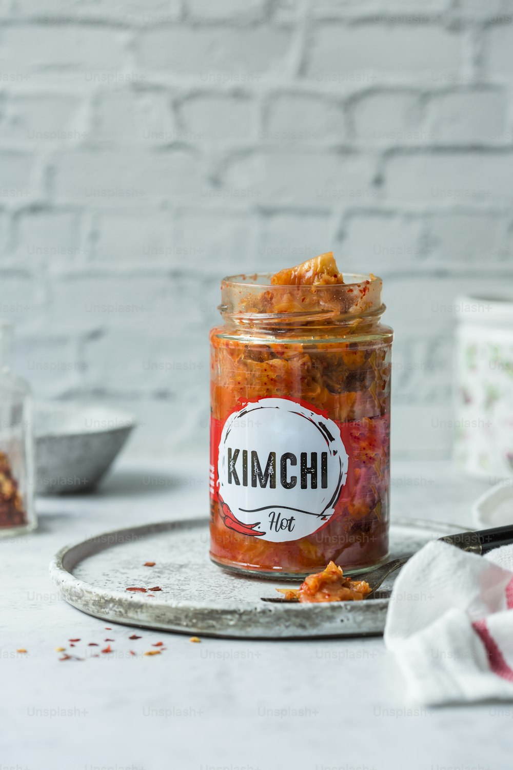 a glass jar filled with food sitting on top of a table