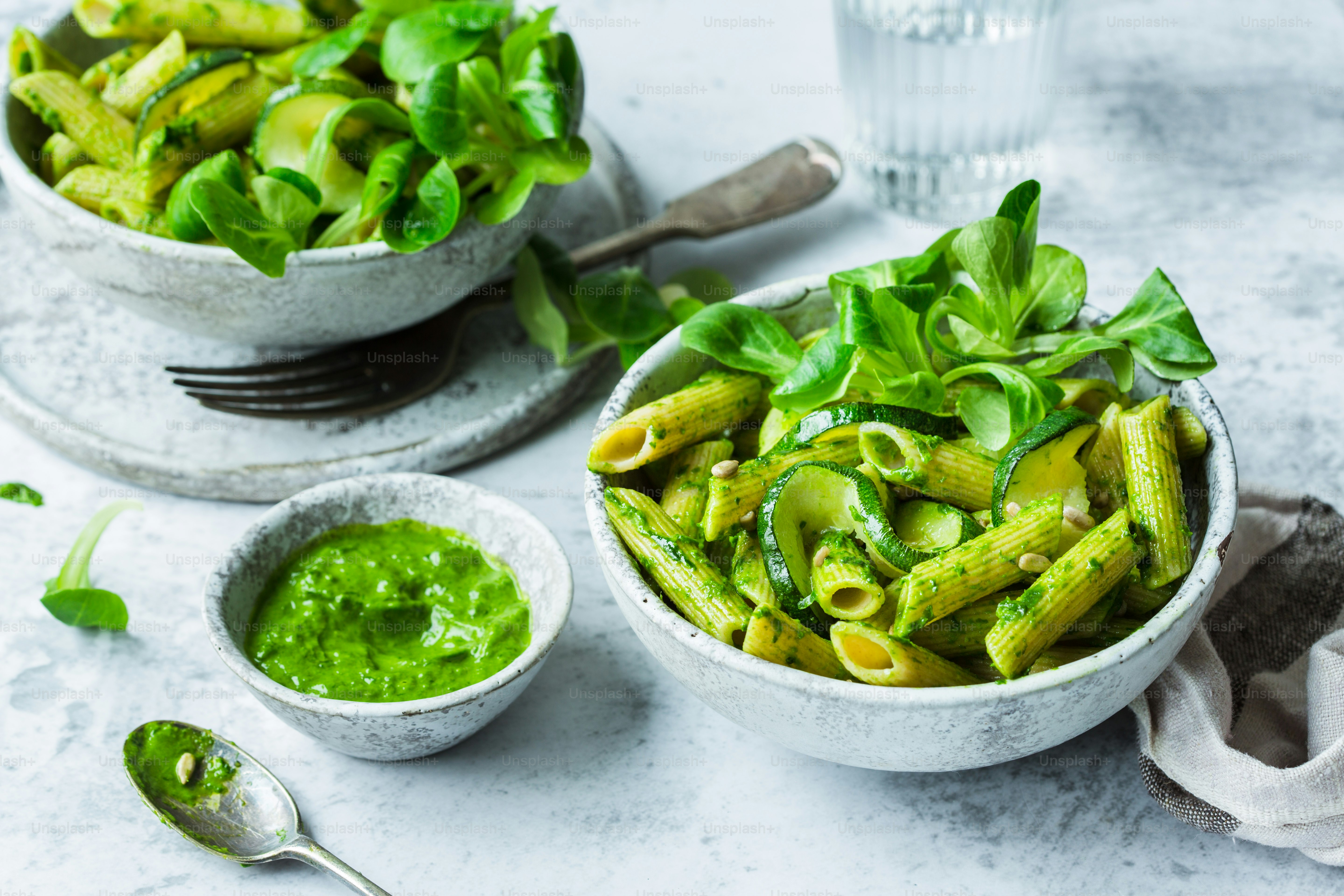 a couple of bowls of food on a table