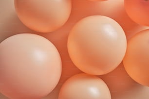 a close up of a bunch of orange eggs