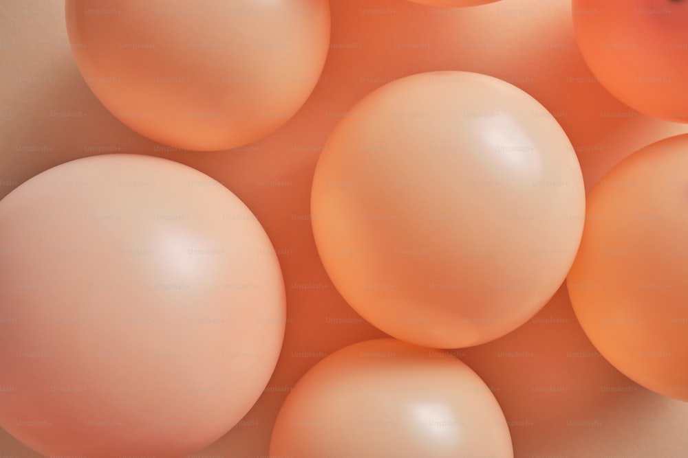 a close up of a bunch of orange eggs