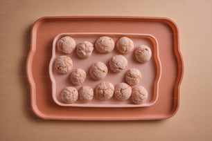 a tray with a bunch of doughnuts on it