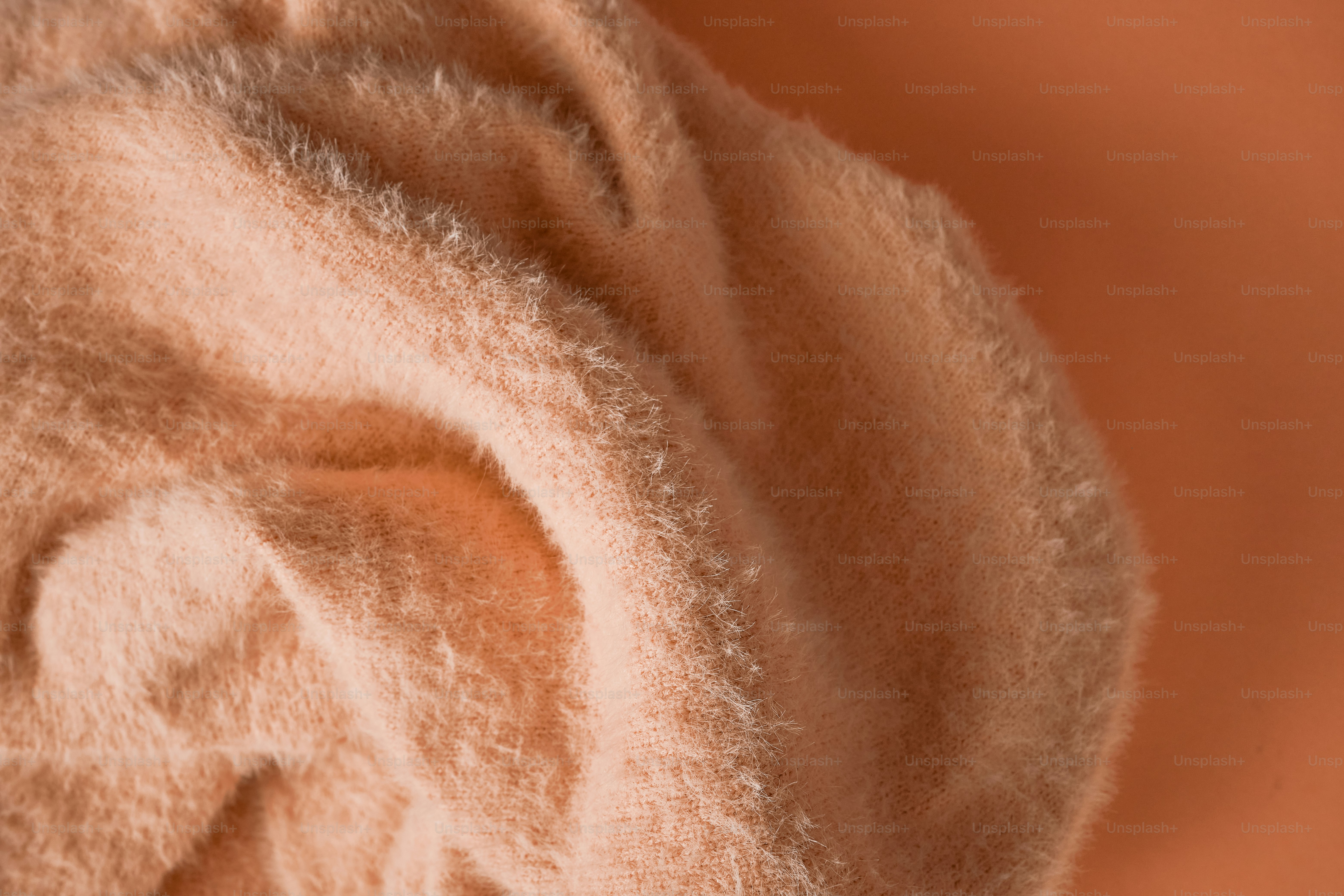 peach fuzz colored wool textile