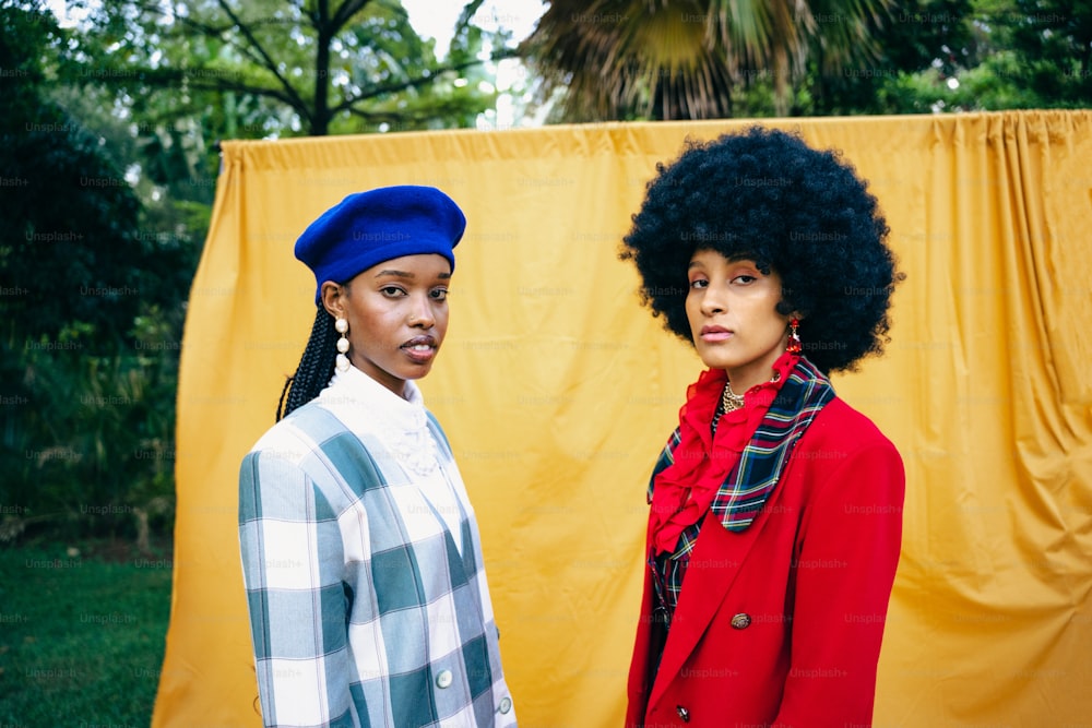 a couple of women standing next to each other