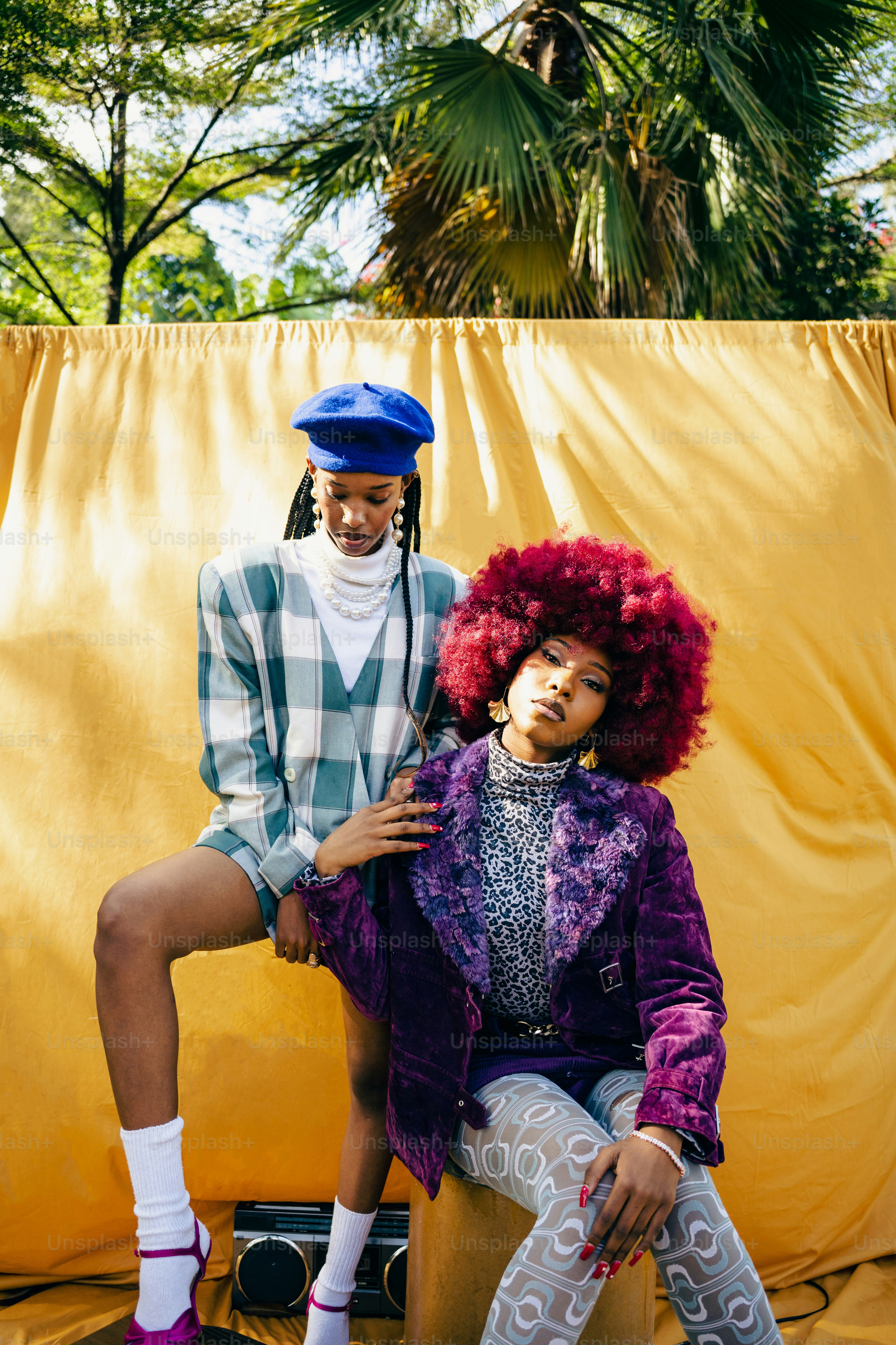a couple of people that are sitting on a bench