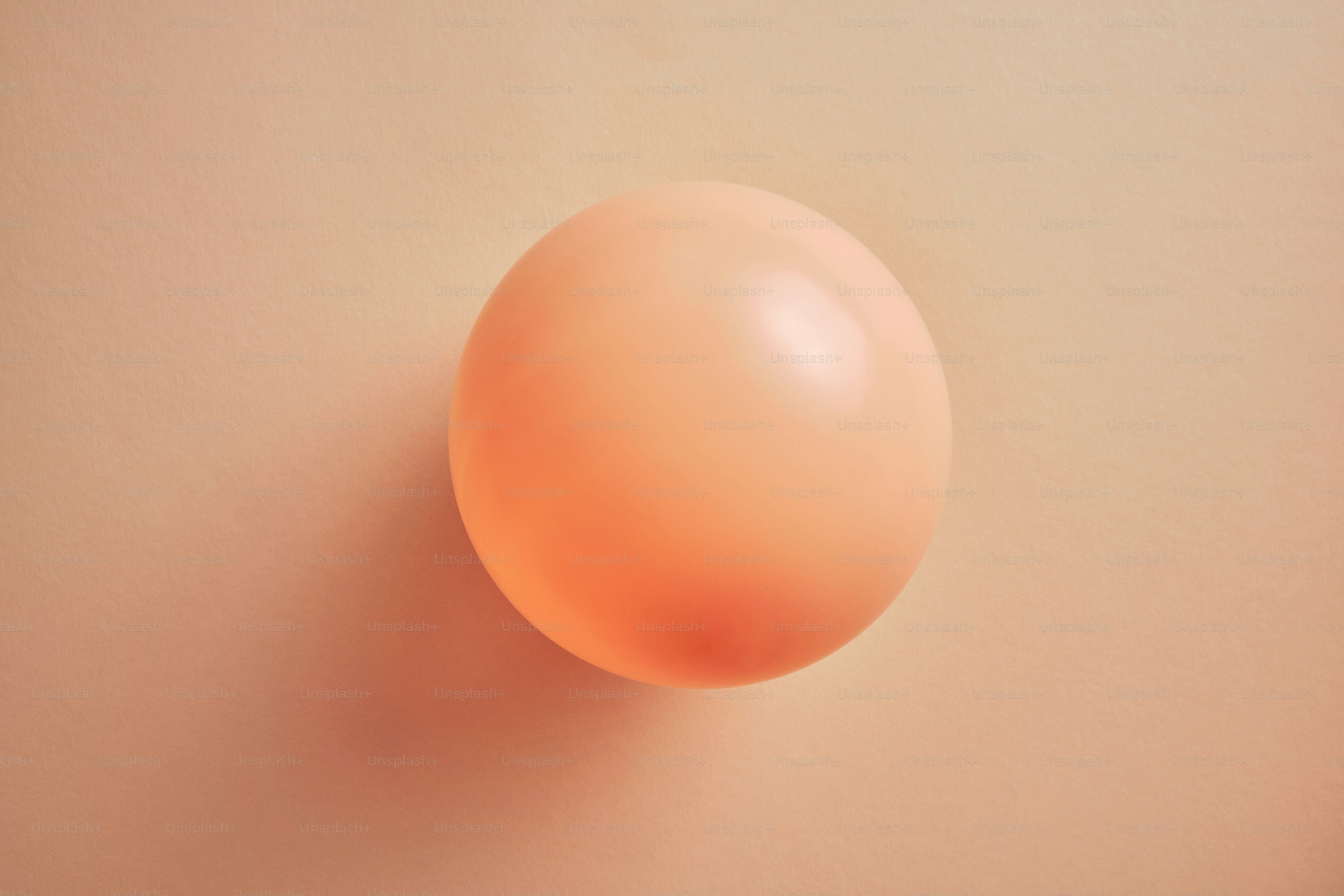 peach fuzz colored balloons