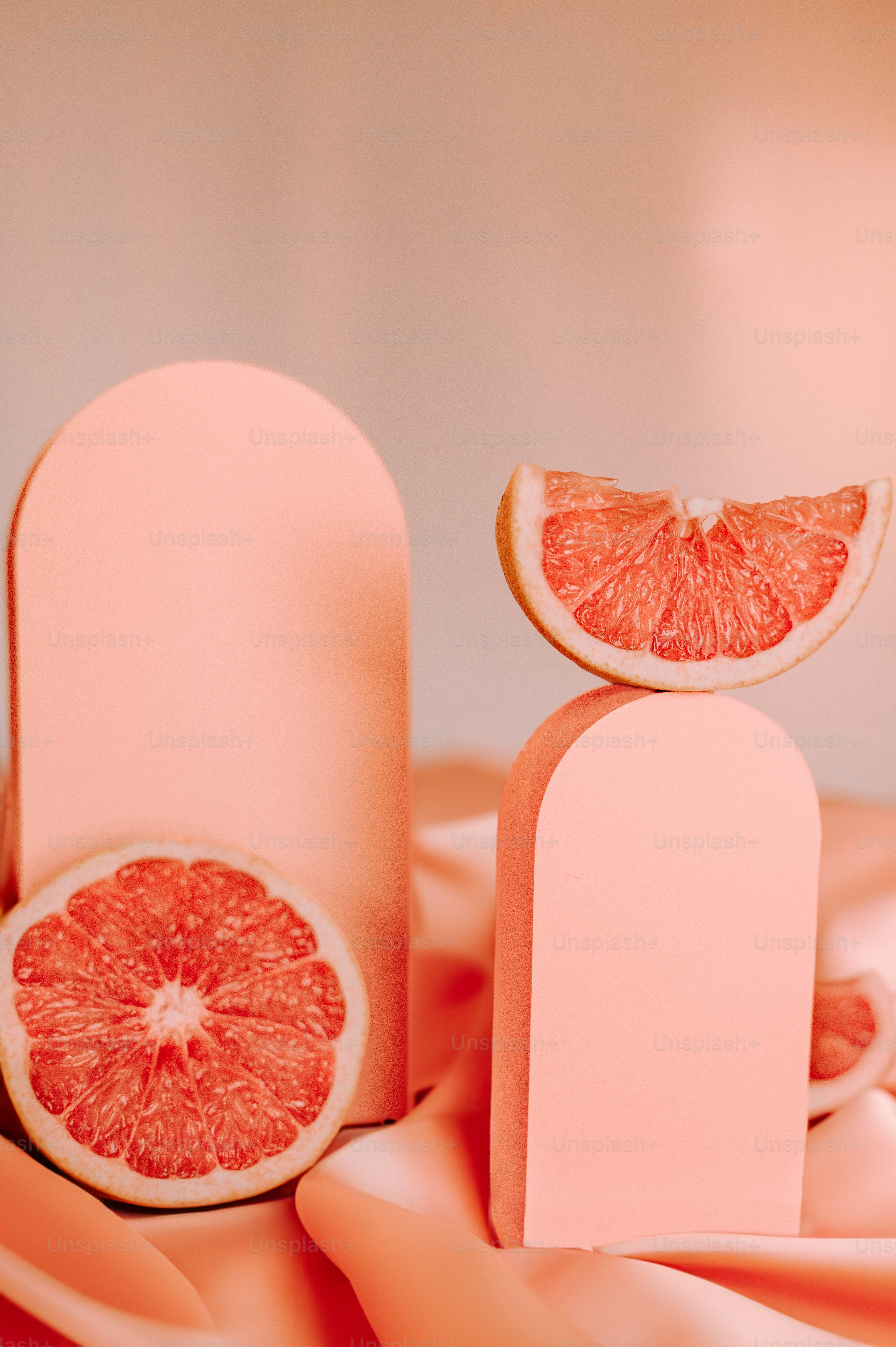 a grapefruit cut in half sitting on top of a table