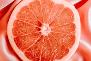 a close up of a grapefruit cut in half