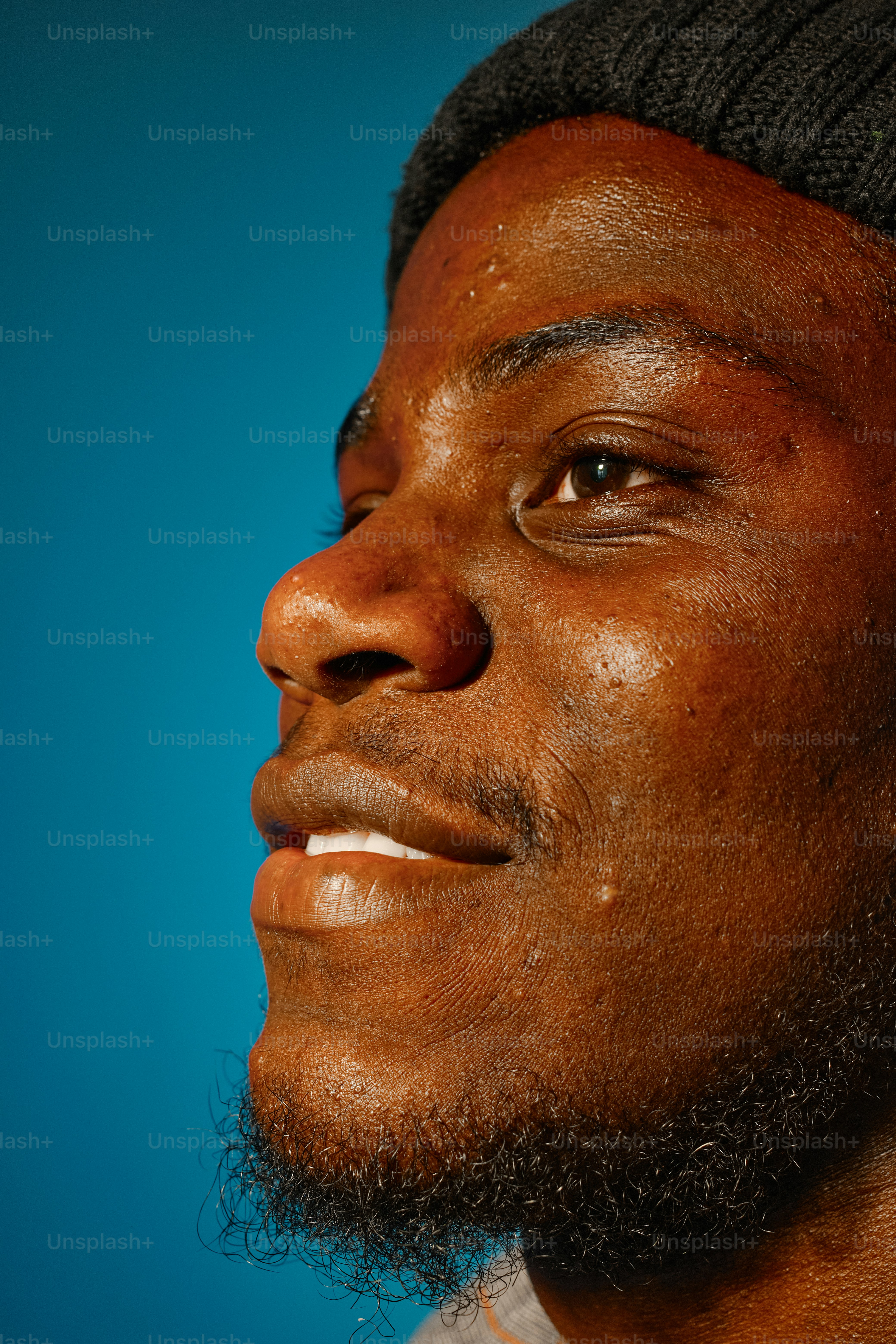 a close up of a person with a beard