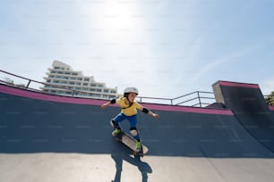 a person riding a skate board at a skate park