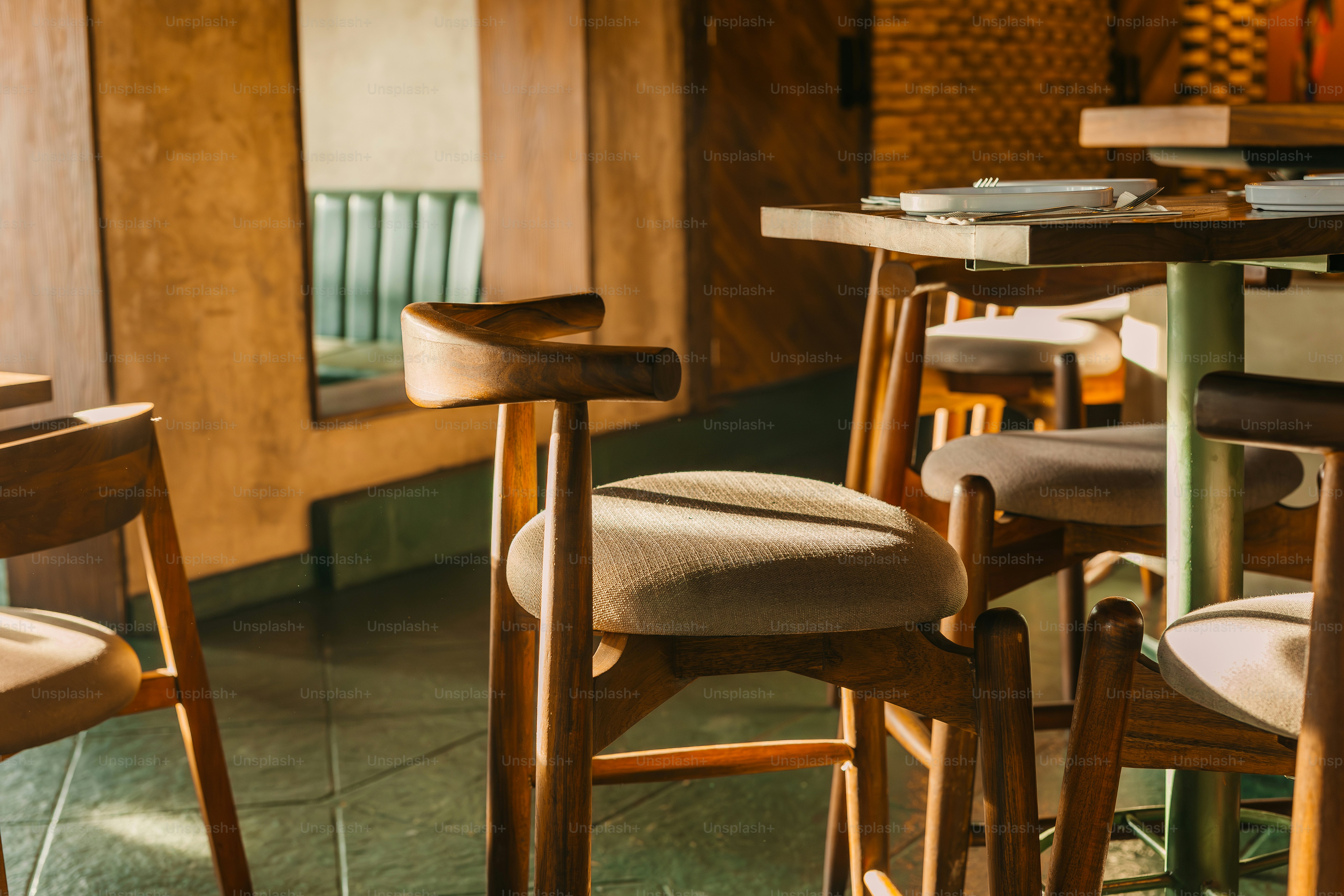 a row of wooden chairs sitting next to each other