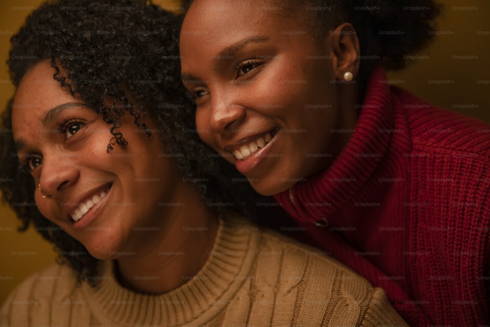 a couple of women standing next to each other