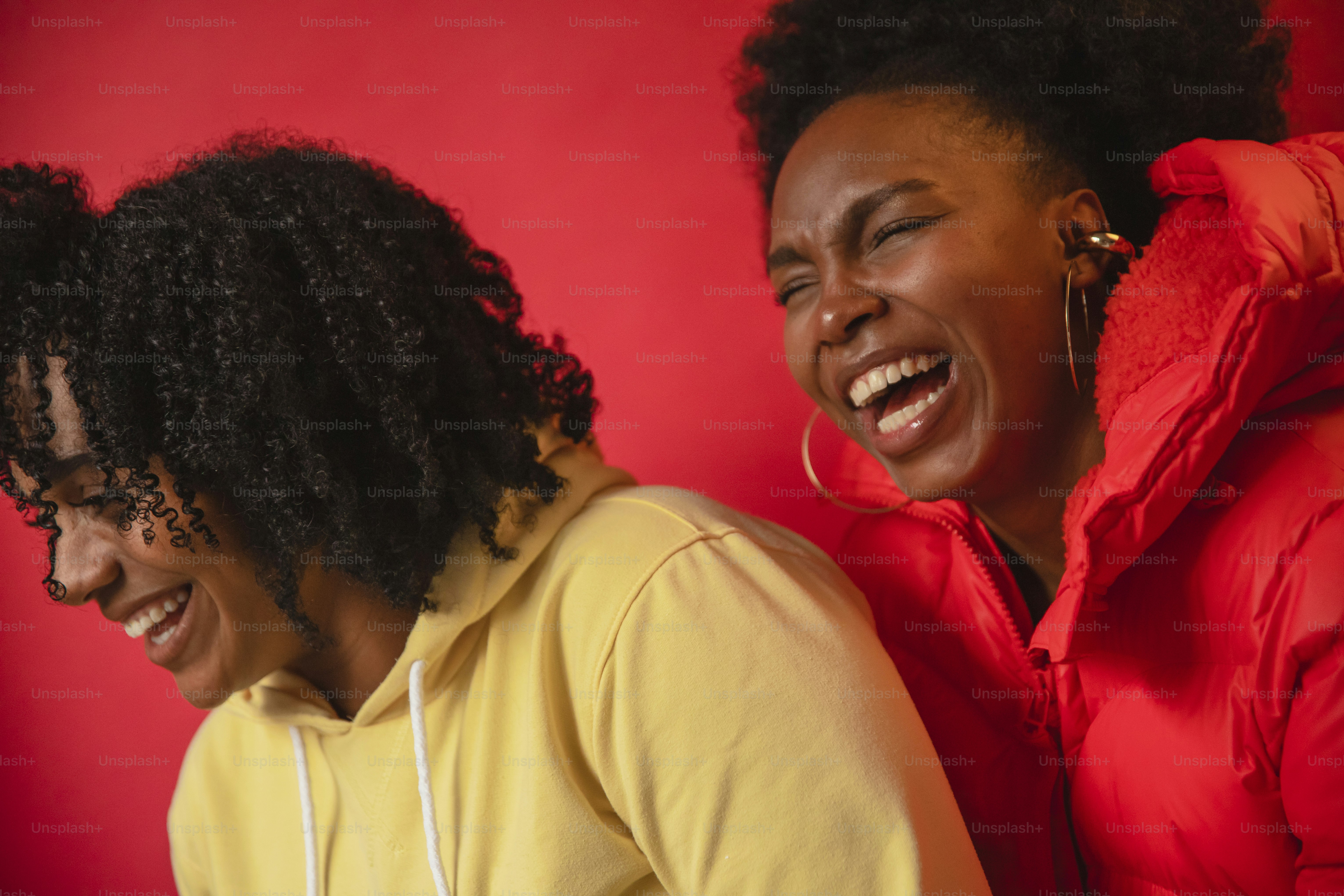 a couple of women standing next to each other