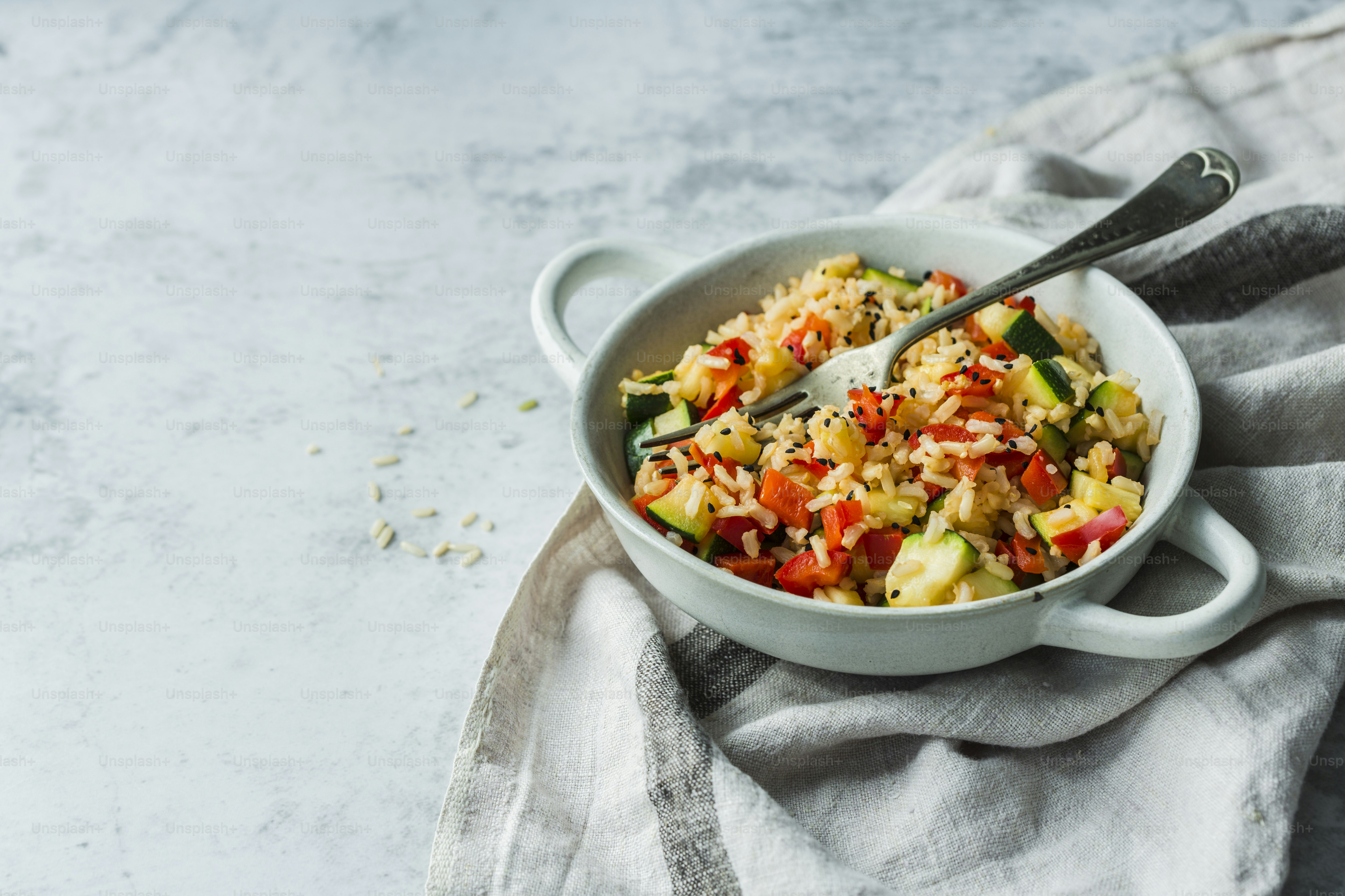 a bowl of food with a spoon in it