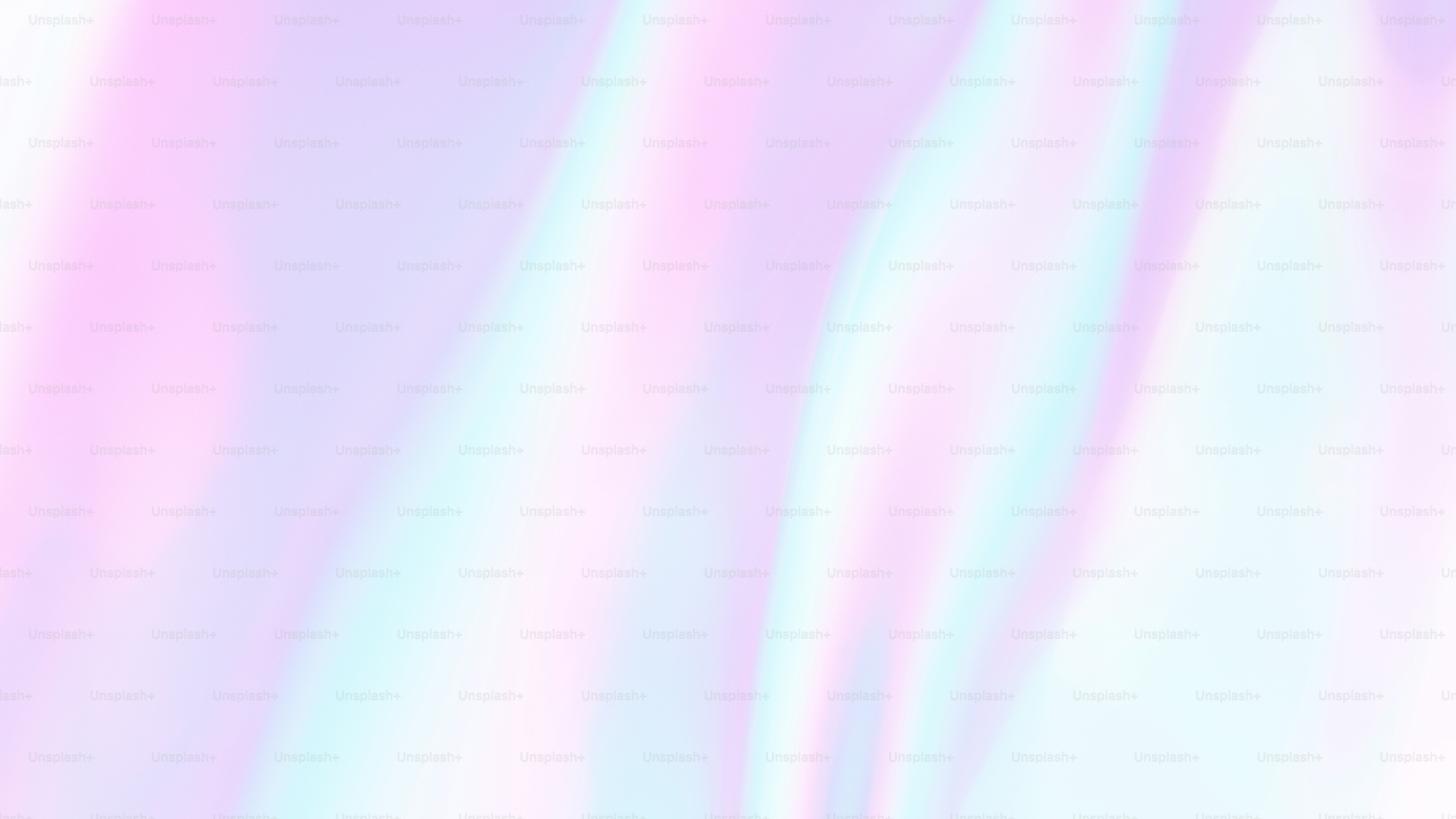 a blurry image of a pink and blue background