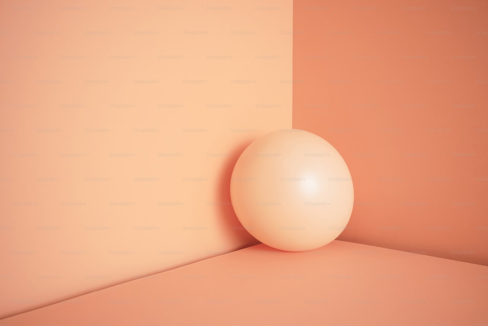 uma bola branca sentada em um canto de uma sala