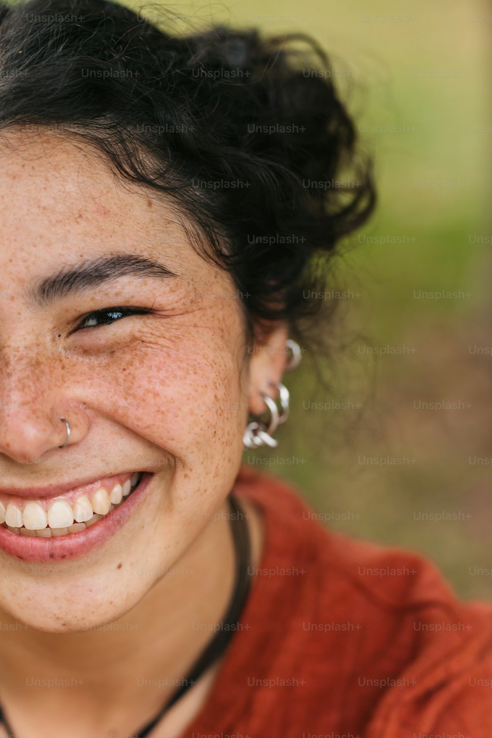 a close up of a person with freckles on