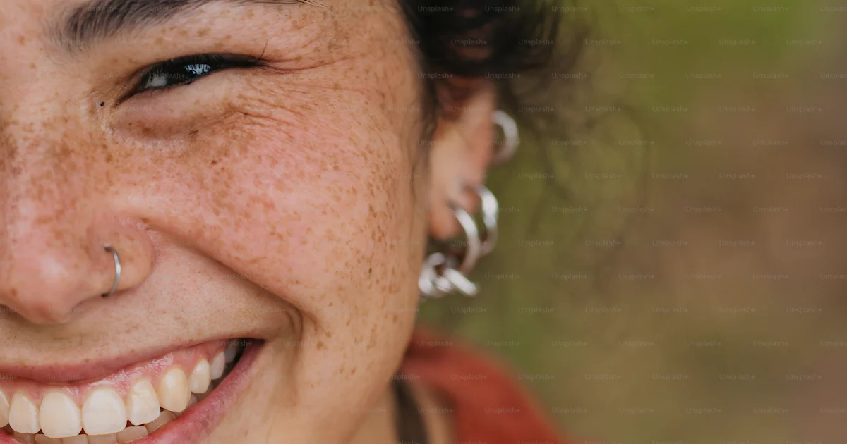 Frecking A close up of a person with freckles on photo – Joy Image on Unsplash