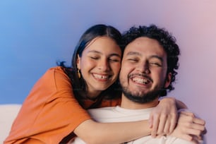 a man and a woman hugging each other