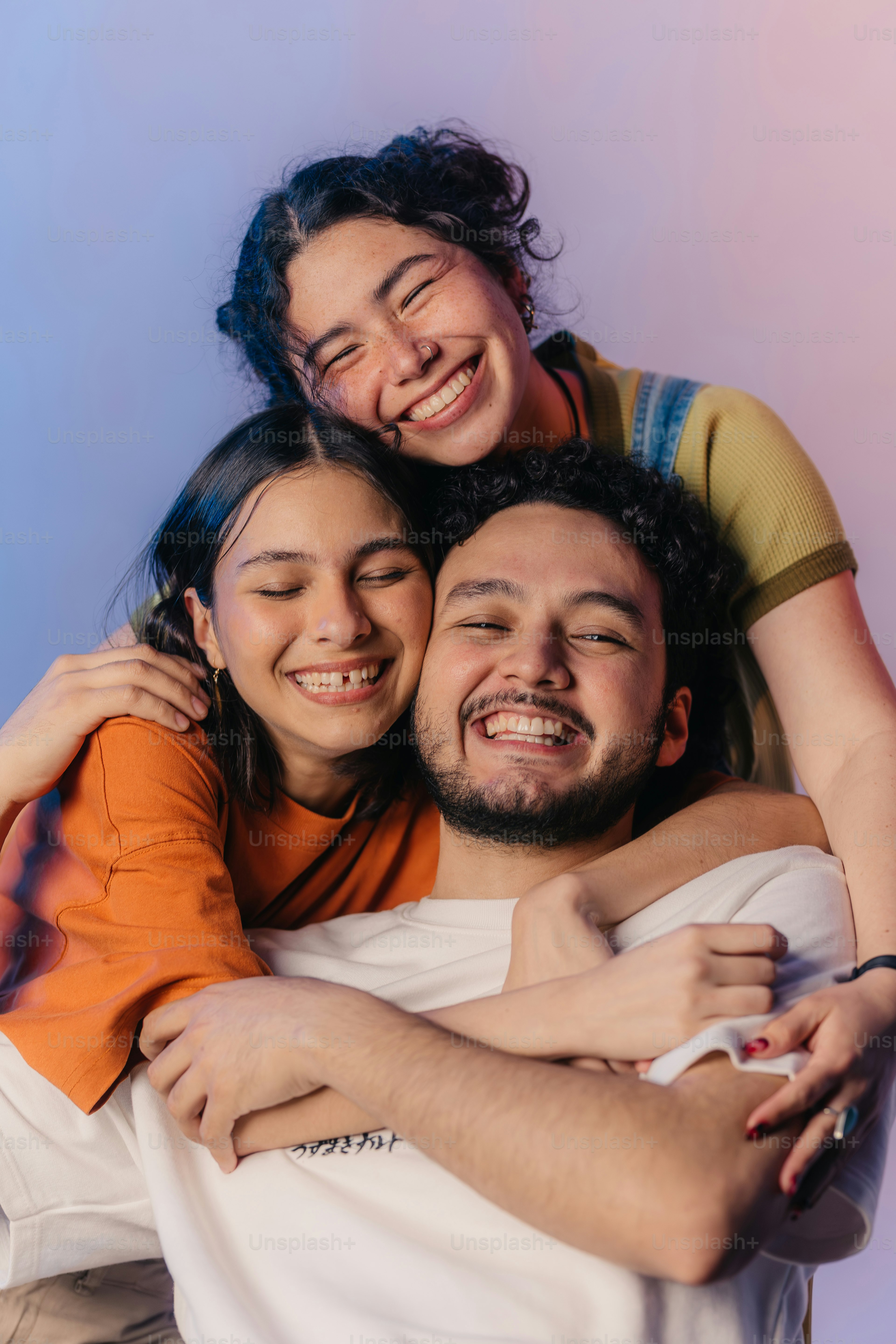 a couple of people that are hugging each other