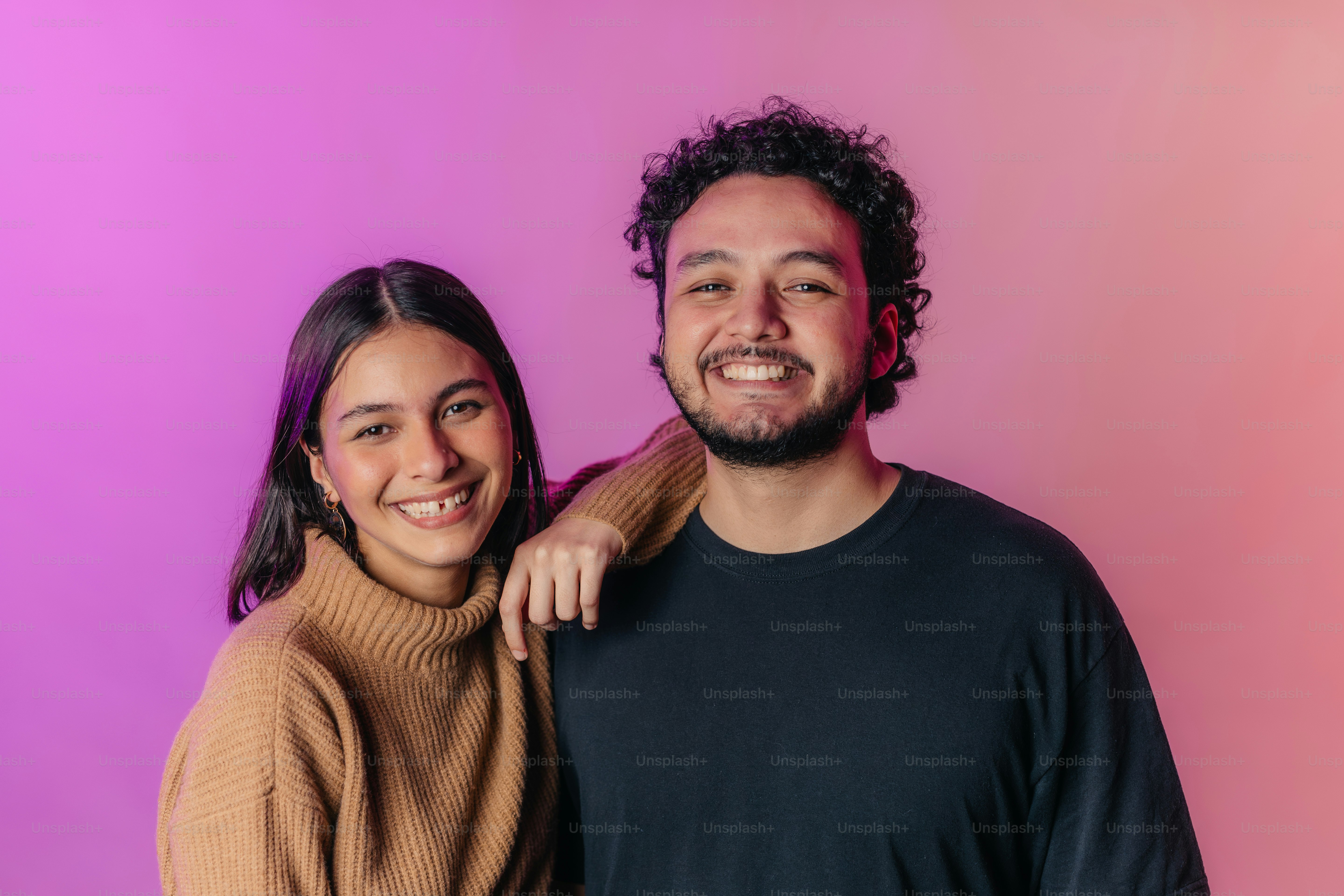 a man and a woman posing for a picture